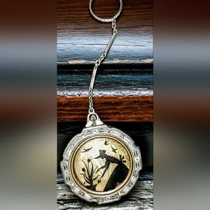 1900's Guilloche Victoria finger compact also Known As Tango Compact